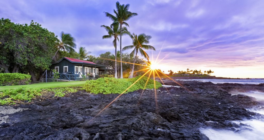 Eva Parker Woods Cottage at Mauna Lani Resort at sunset. Twilight at Kalahuipuaa. Kalahuipuaa Fishponds